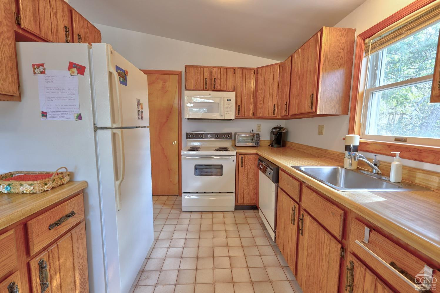 496 New Forge Road Ancram, NY 12502 - Photo 39 of 87 a kitchen with stainless steel appliances a refrigerator sink and cabinets