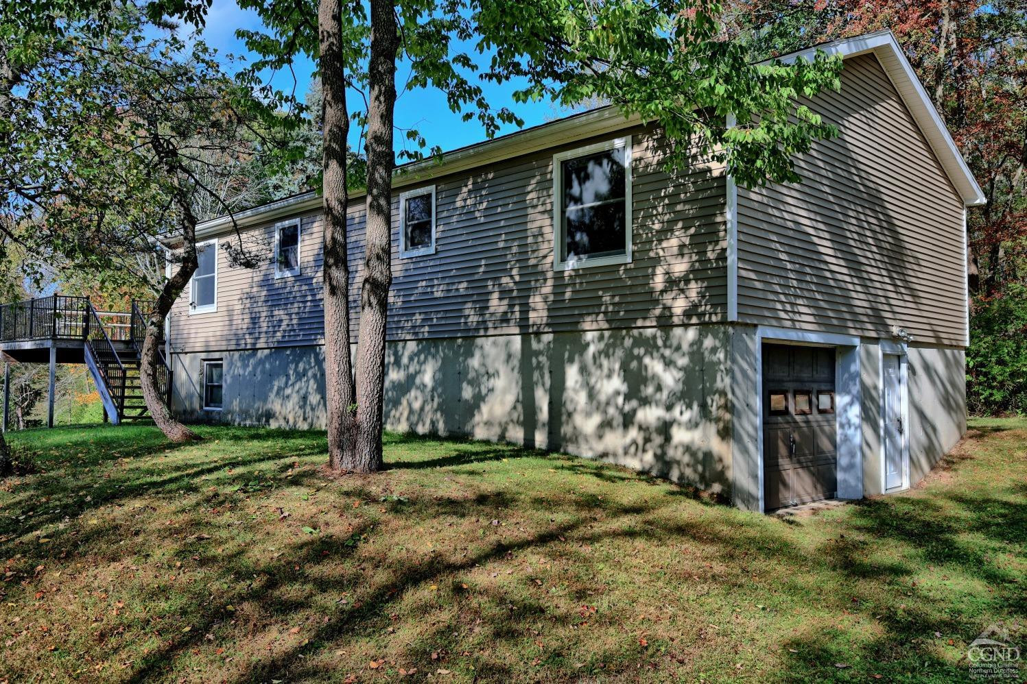 496 New Forge Road Ancram, NY 12502 - Photo 73 of 87 a backyard of a house with lots of green space