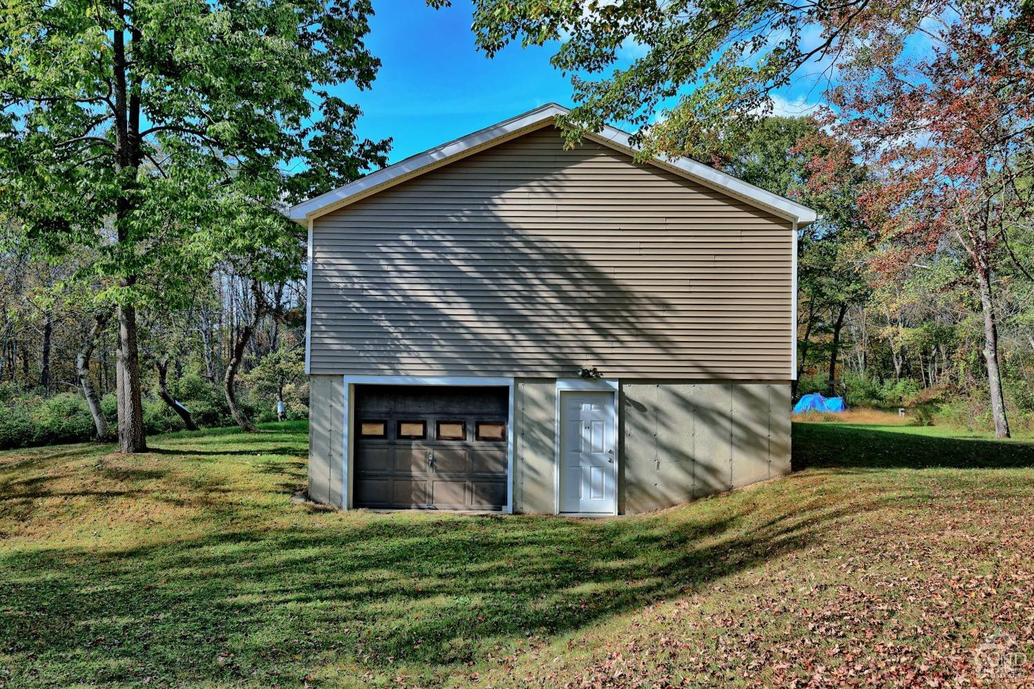 496 New Forge Road Ancram, NY 12502 - Photo 74 of 87 a view of a house with a yard