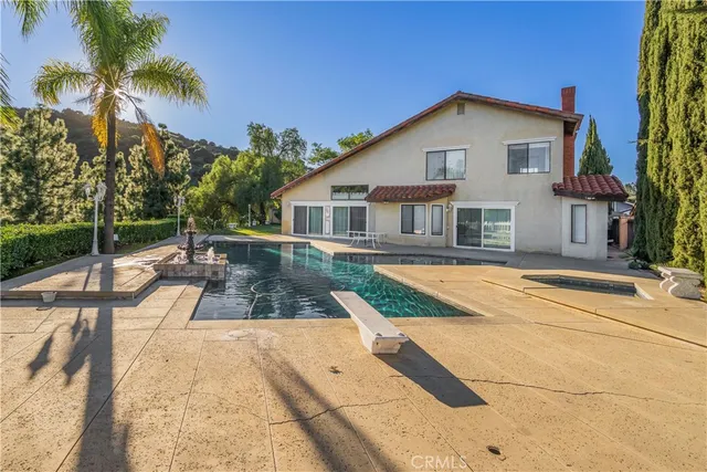 a view of a house with a swimming pool