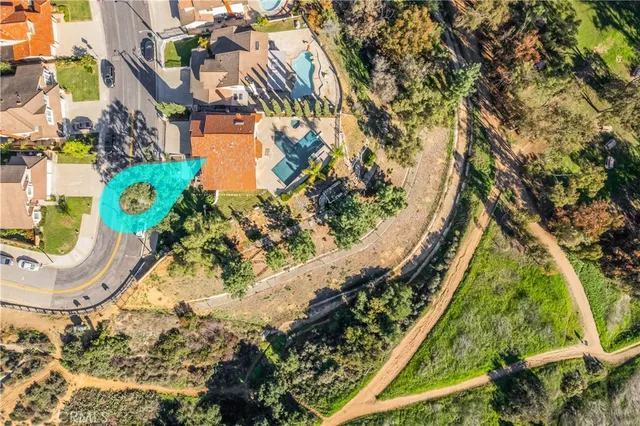 an aerial view of a city with lots of residential buildings