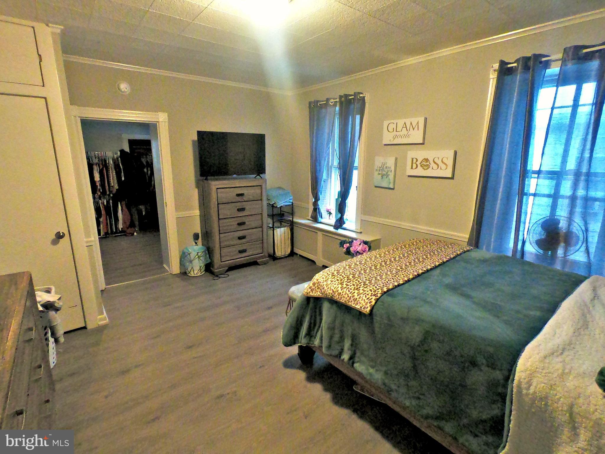 4133 Penn Avenue Sinking Spring, PA 19608 - Photo 12 of 53 a bedroom with a bed and a flat screen tv