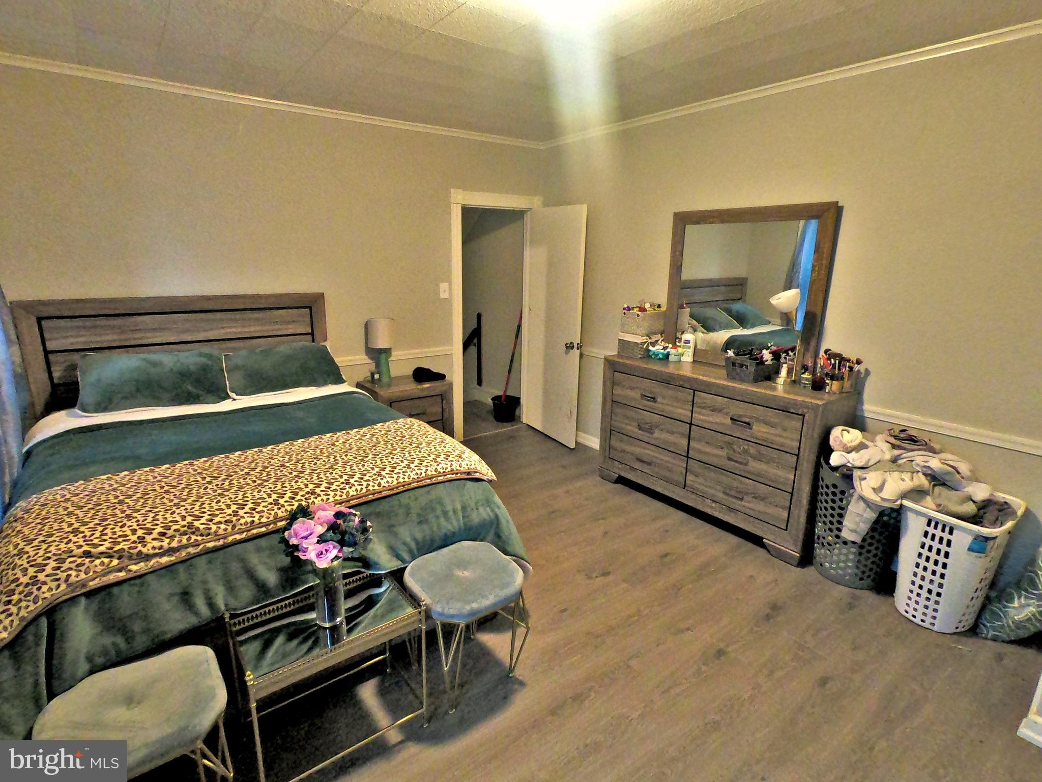 4133 Penn Avenue Sinking Spring, PA 19608 - Photo 13 of 53 a bedroom with a bed and furniture