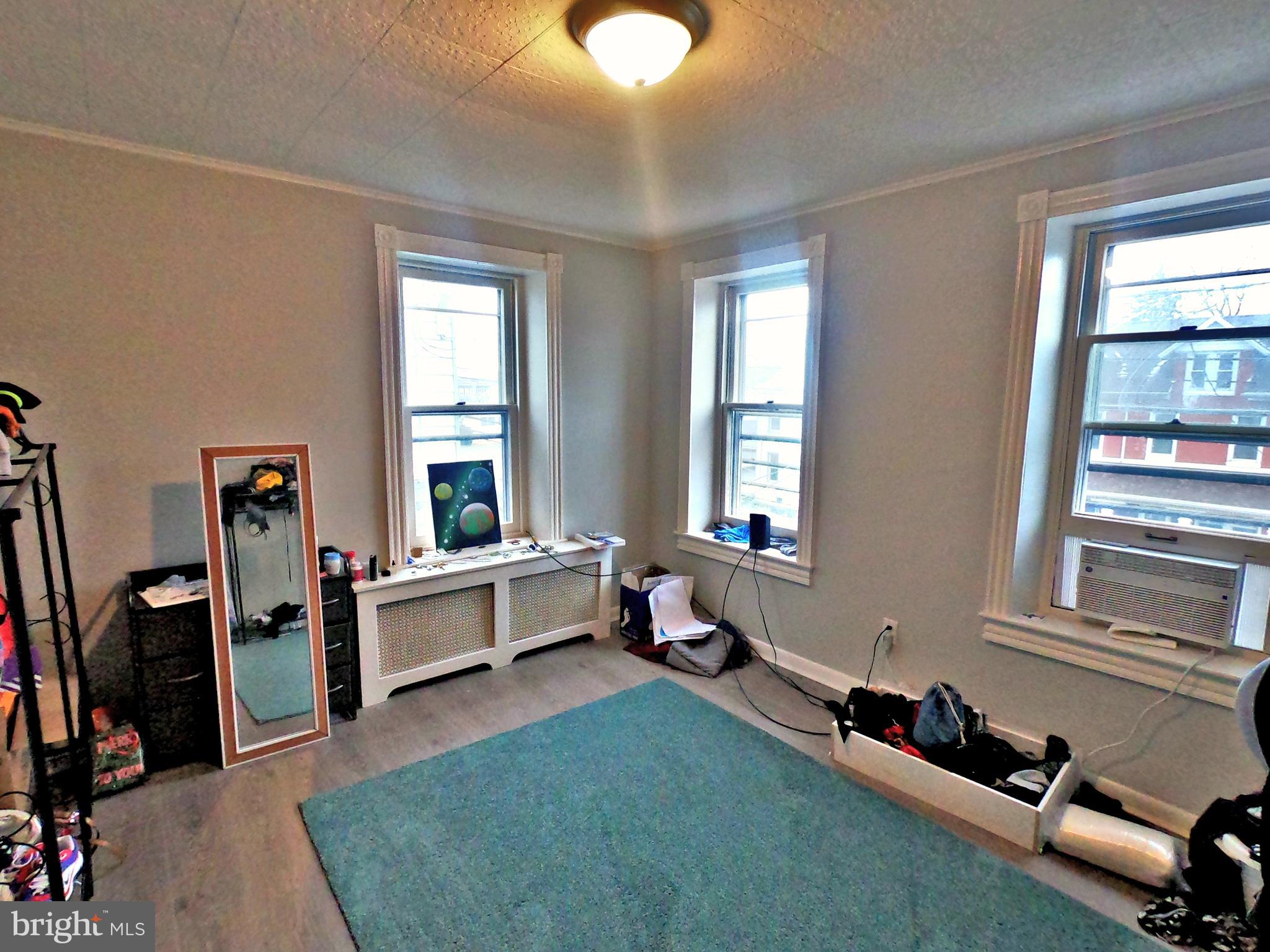 4133 Penn Avenue Sinking Spring, PA 19608 - Photo 15 of 53 a room with furniture toys and a window