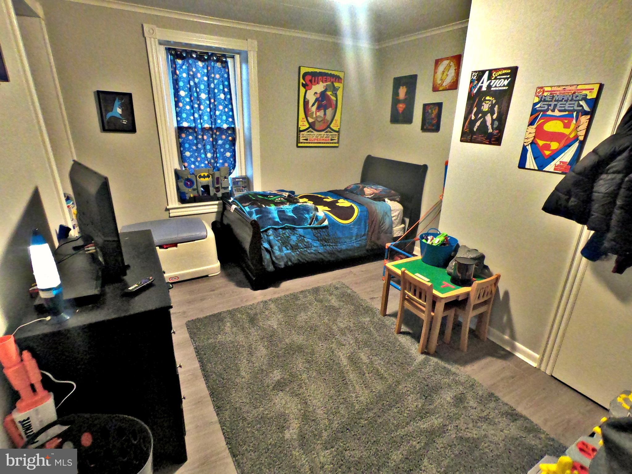 4133 Penn Avenue Sinking Spring, PA 19608 - Photo 17 of 53 a living room with furniture and a flat screen tv