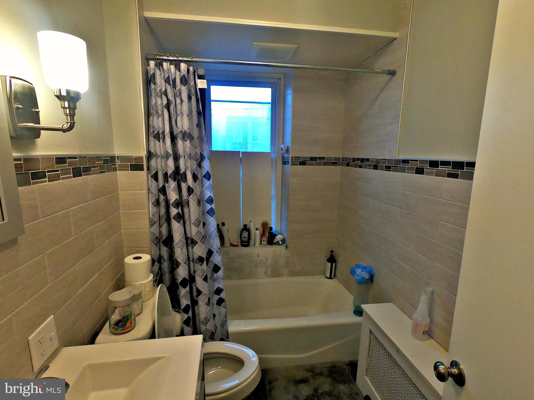 4133 Penn Avenue Sinking Spring, PA 19608 - Photo 18 of 53 a bathroom with a toilet sink and bathtub