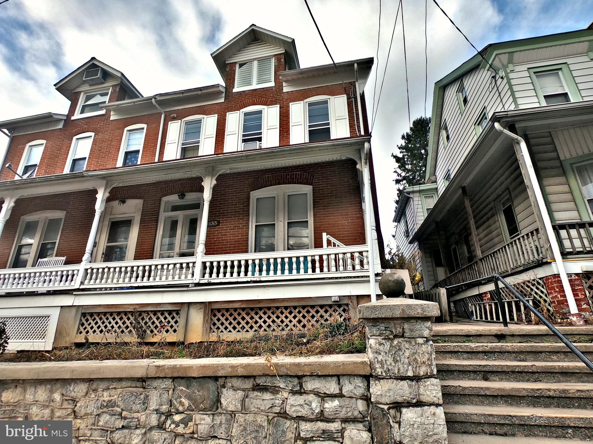 4133 Penn Avenue Sinking Spring, PA 19608 - Photo 2 of 53 a front view of a house with a balcony