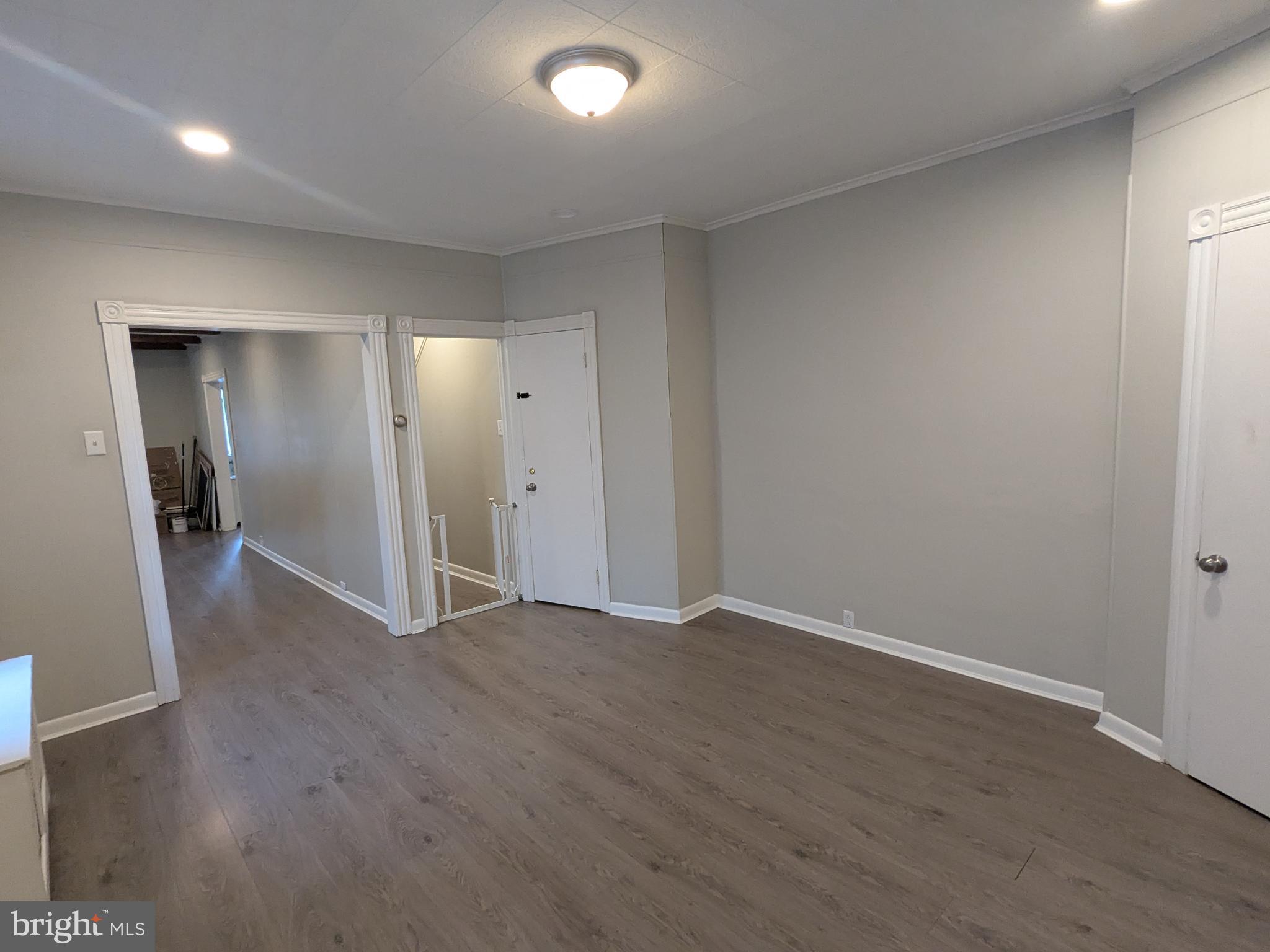4133 Penn Avenue Sinking Spring, PA 19608 - Photo 32 of 53 an empty room with wooden floor & windows