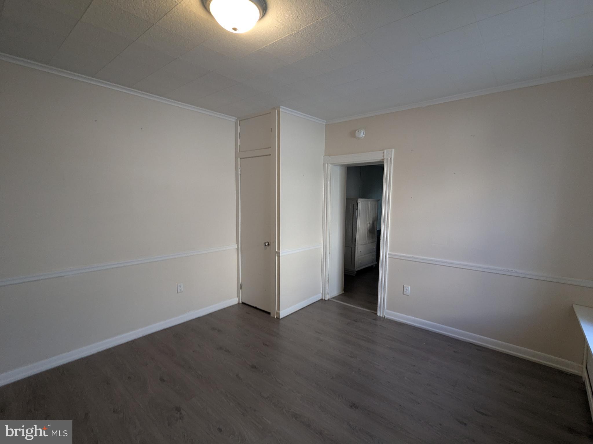 4133 Penn Avenue Sinking Spring, PA 19608 - Photo 33 of 53 a view of a room with wooden floor and white walls