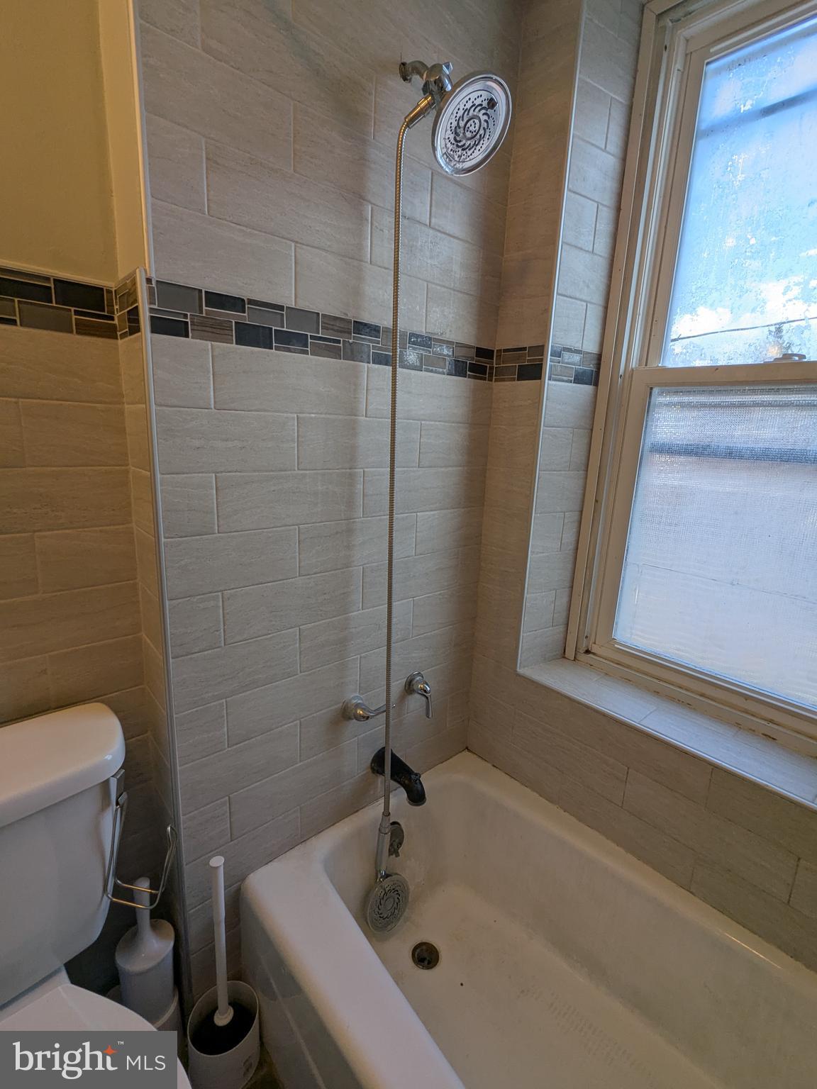 4133 Penn Avenue Sinking Spring, PA 19608 - Photo 43 of 53 a bathroom with a sink and a bathtub