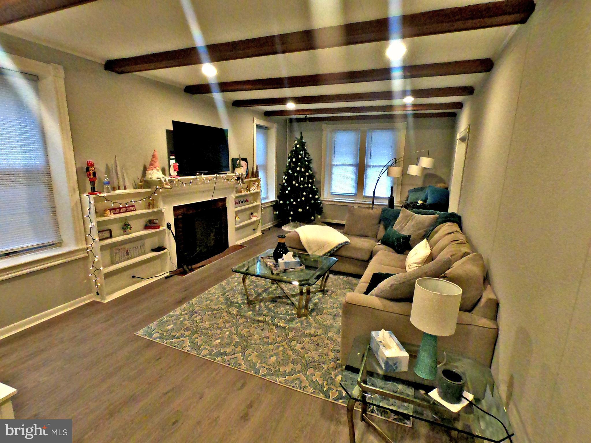 4133 Penn Avenue Sinking Spring, PA 19608 - Photo 6 of 53 a living room with furniture and a flat screen tv