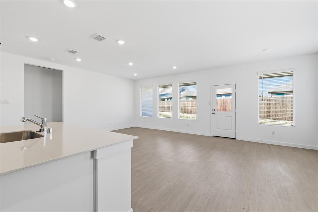 4912 Ascot Way Princeton, TX 75407 - Photo 17 of 35 a view of an empty room with a window