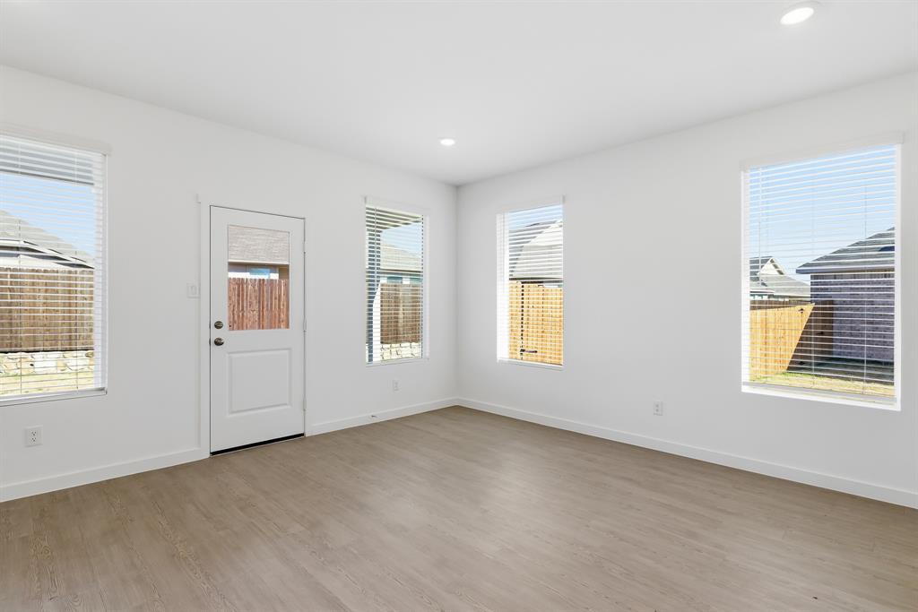 4912 Ascot Way Princeton, TX 75407 - Photo 18 of 35 a view of an empty room with a window