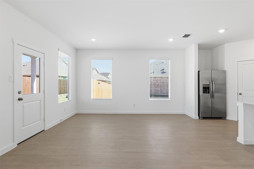 4912 Ascot Way Princeton, TX 75407 - Photo 19 of 35 a view of livingroom with hardwood