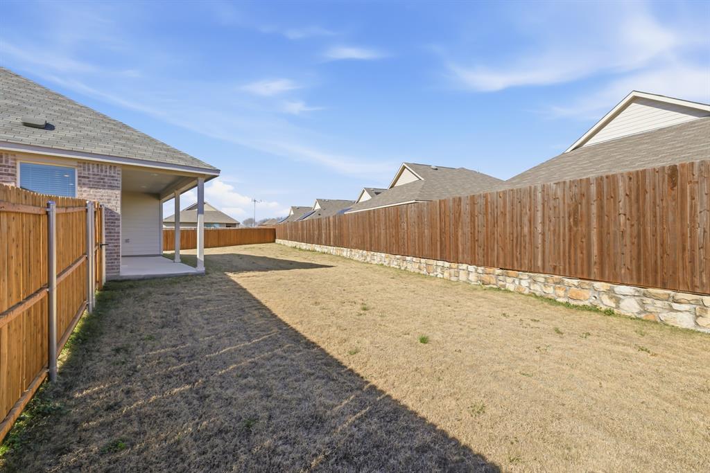 4912 Ascot Way Princeton, TX 75407 - Photo 34 of 35 a view of a backyard