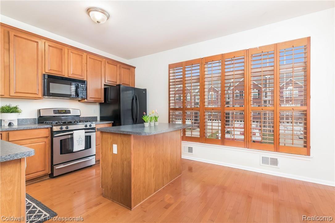 702 Cherry Orchard Road Canton, MI 48188 - Photo 4 of 31 Charming Hardwood Floors and Custom Shutters