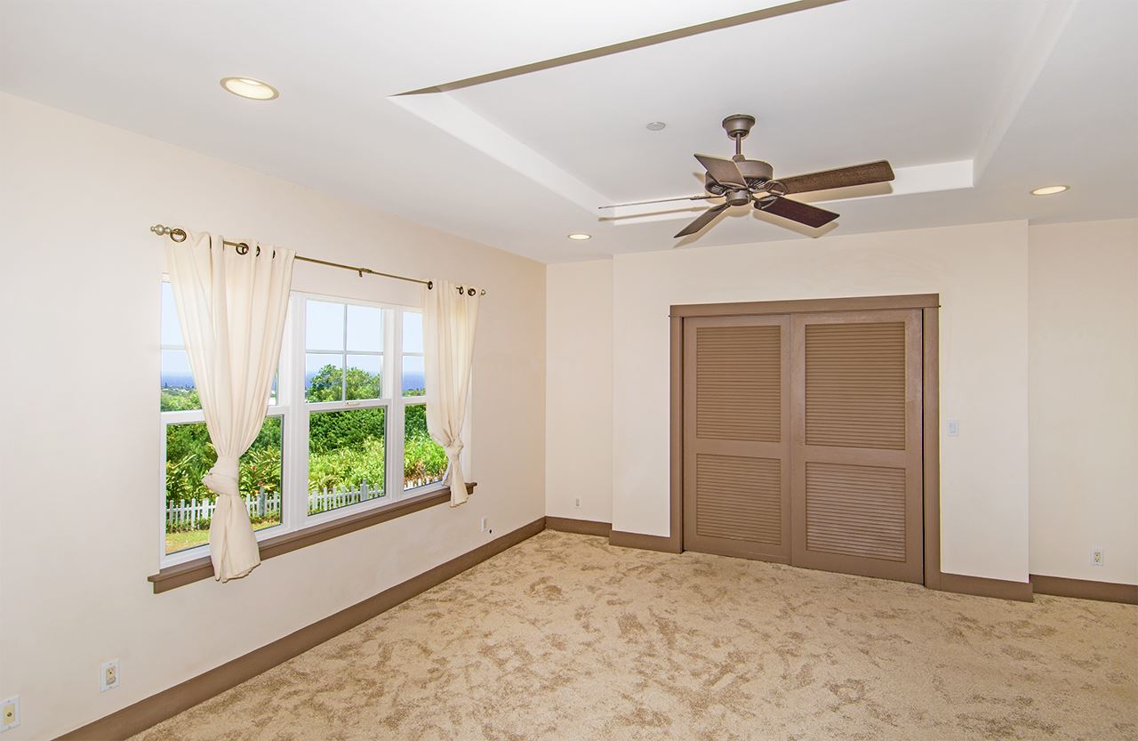 230-240 Mauu Place Haiku, HI 96708 - Photo 11 of 16 a view of an empty room with a window