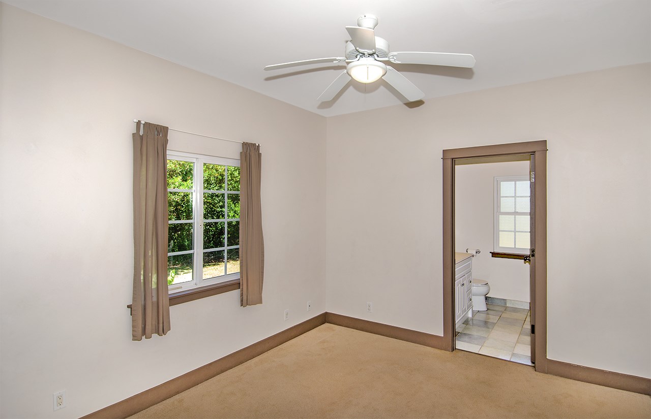 230-240 Mauu Place Haiku, HI 96708 - Photo 13 of 16 an empty room with windows and fan