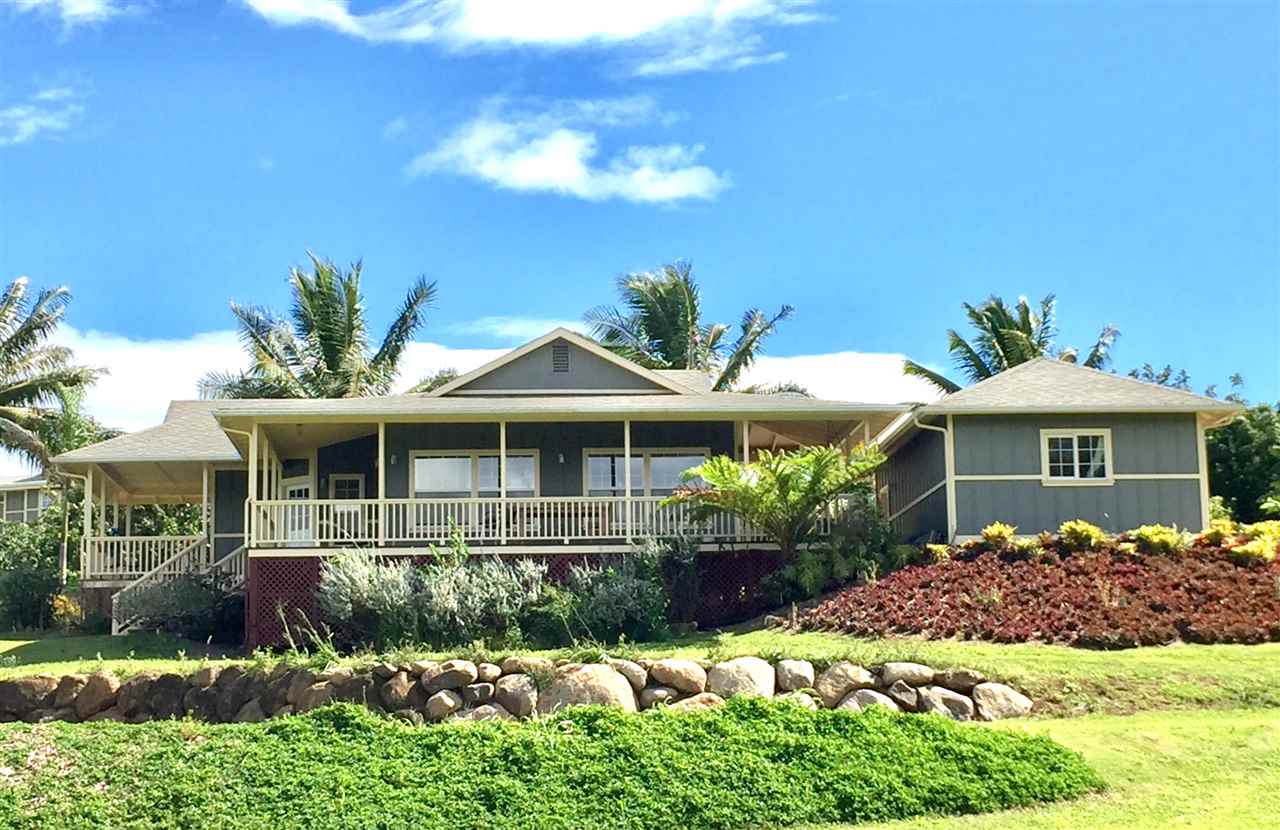 230-240 Mauu Place Haiku, HI 96708 - Photo 15 of 16 a front view of a house with a yard