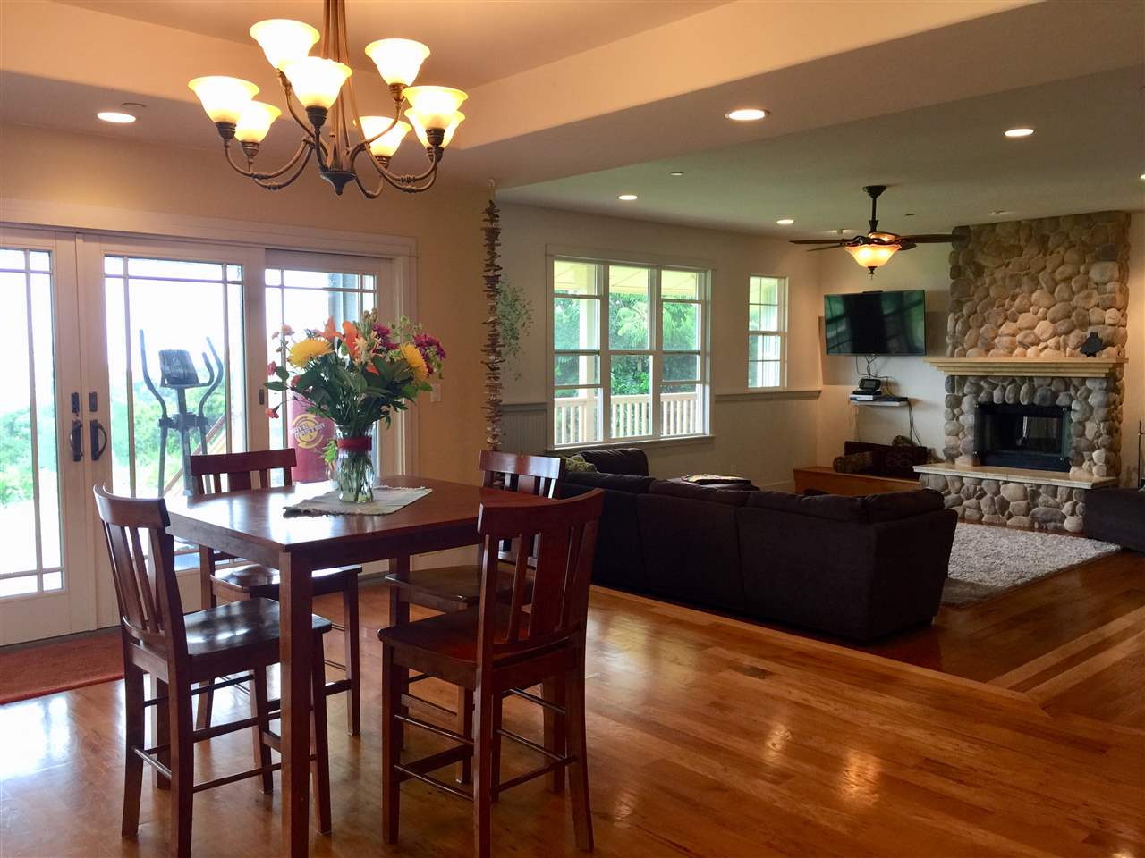230-240 Mauu Place Haiku, HI 96708 - Photo 8 of 16 a view of a dining room with furniture window and wooden floor