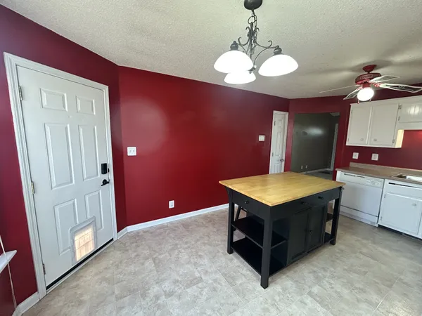 a view of hallway with livingroom