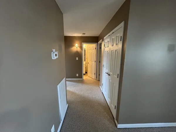 a bathroom with a shower and a sink