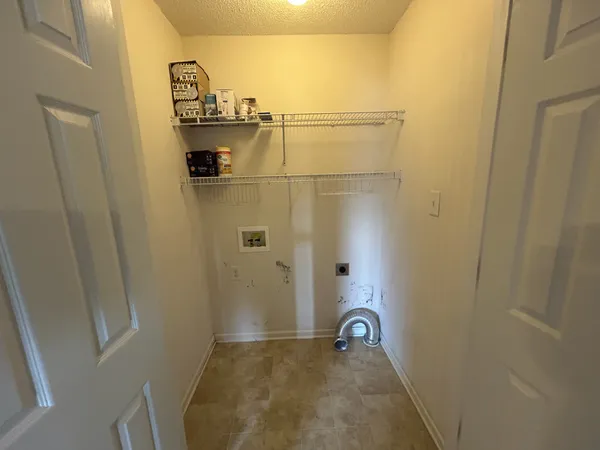 a view of a livingroom from a hallway