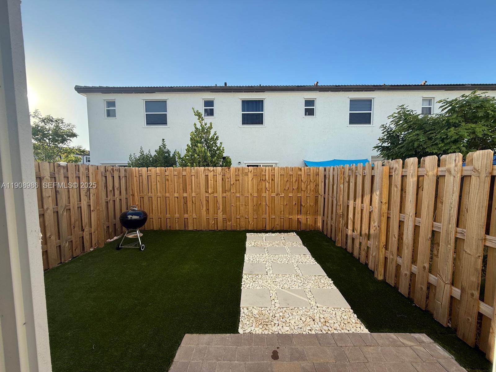 2894 Southeast 26th Terrace, Unit 1 Homestead, FL 33035 - Photo 7 of 11 a view of backyard with outdoor space
