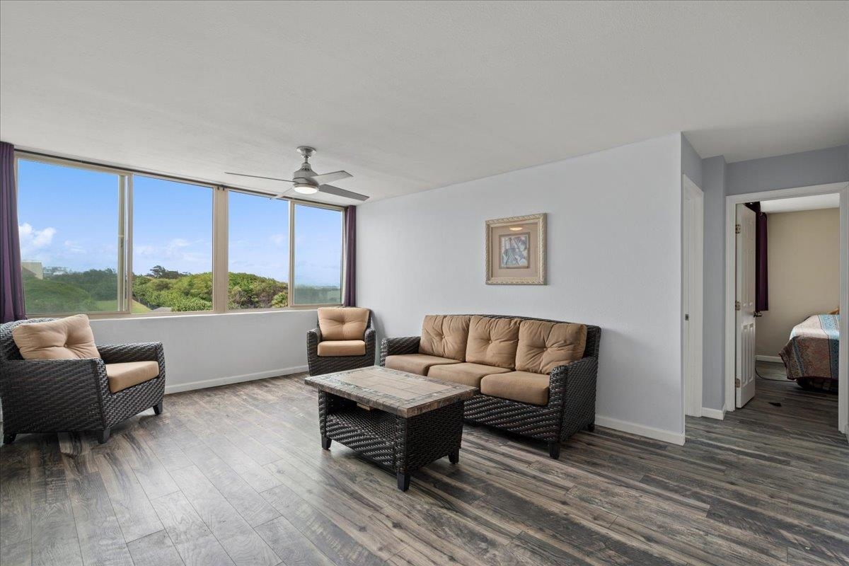 111 Kahului Beach Road, Unit D412 Kahului, HI 96732 - Photo 15 of 37 a living room with furniture and a large window