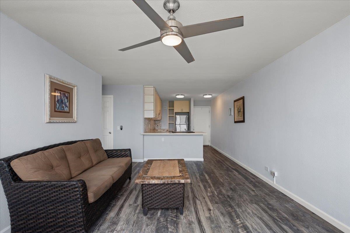 111 Kahului Beach Road, Unit D412 Kahului, HI 96732 - Photo 18 of 37 a living room with furniture and a rug