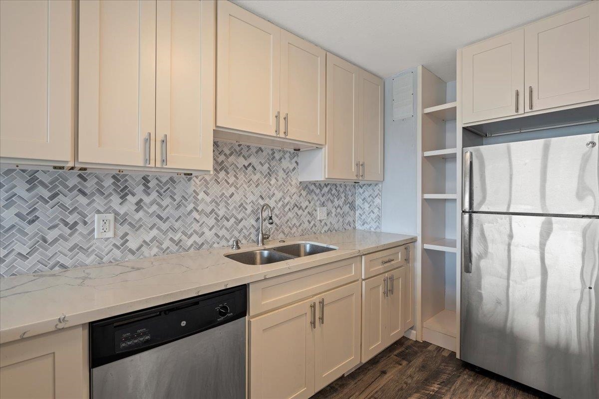 111 Kahului Beach Road, Unit D412 Kahului, HI 96732 - Photo 20 of 37 a kitchen with a sink and cabinets