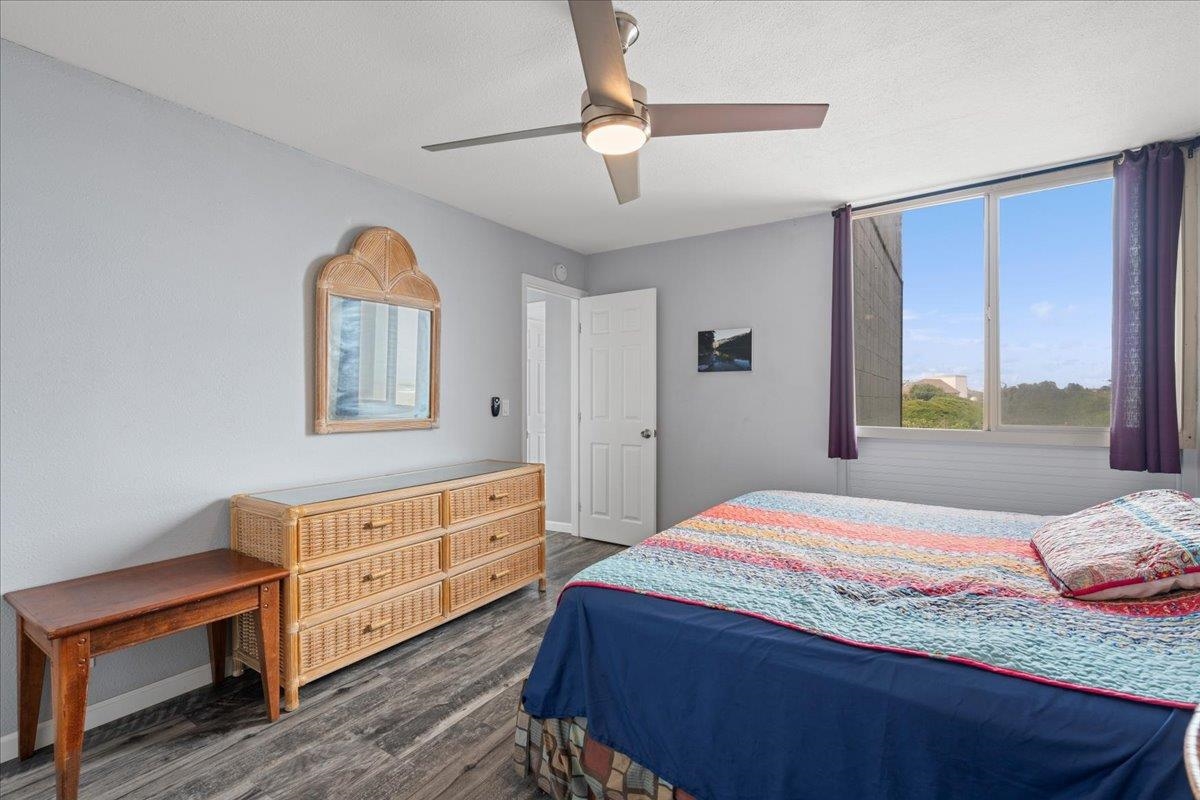 111 Kahului Beach Road, Unit D412 Kahului, HI 96732 - Photo 28 of 37 a bedroom with a bed and a dresser