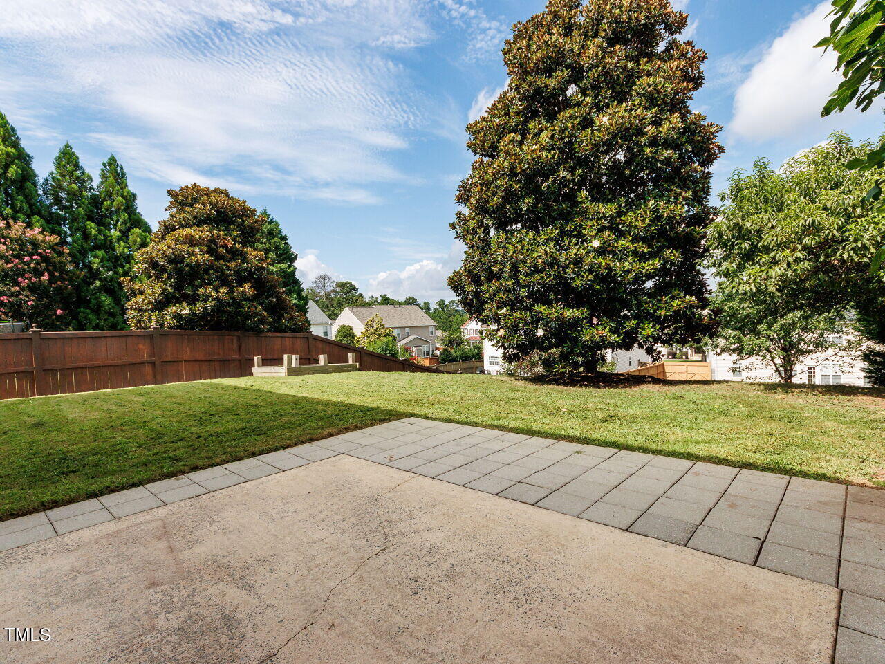 7609 Derek Drive Raleigh, NC 27613 - Photo 39 of 44 Established landscaping, huge magnolia and fig tree.
