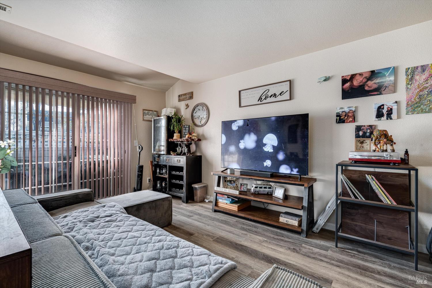 590 Laurel Grove Circle Santa Rosa, CA 95407 - Photo 28 of 44 a bedroom with furniture and a window