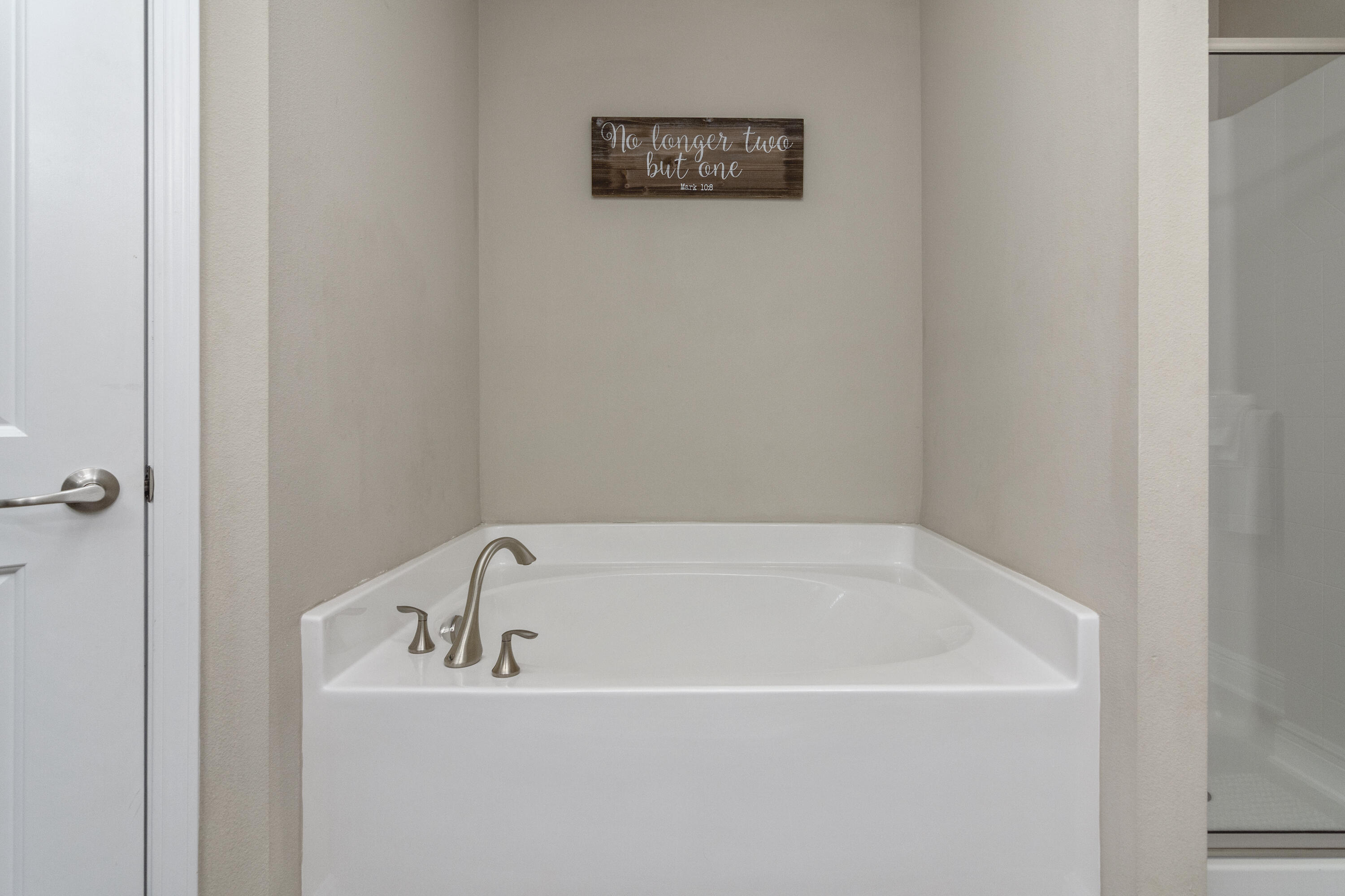 306 Gauntlet Drive Crestview, FL 32539 - Photo 17 of 32 a white bath tub sitting next to a white wall