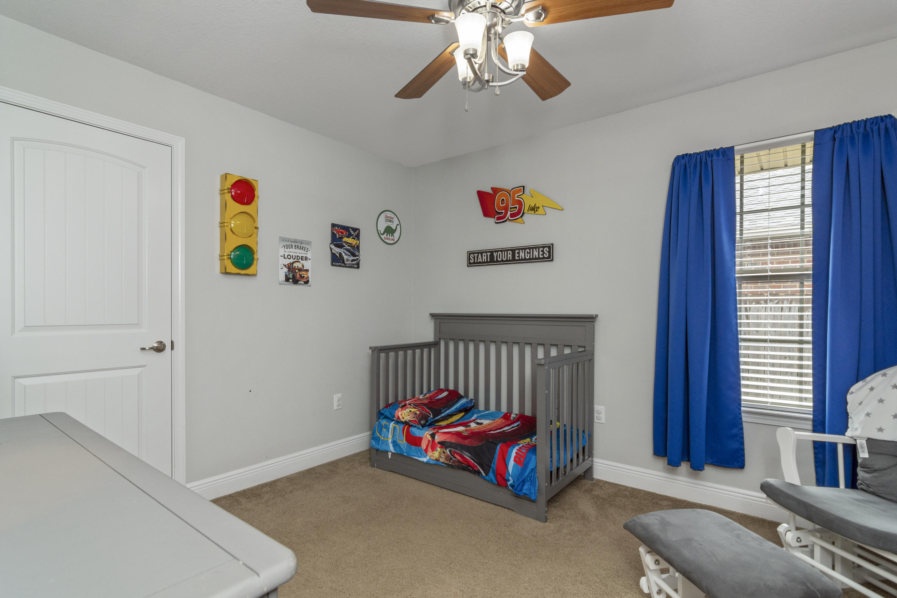 306 Gauntlet Drive Crestview, FL 32539 - Photo 21 of 32 a bedroom with furniture and a window