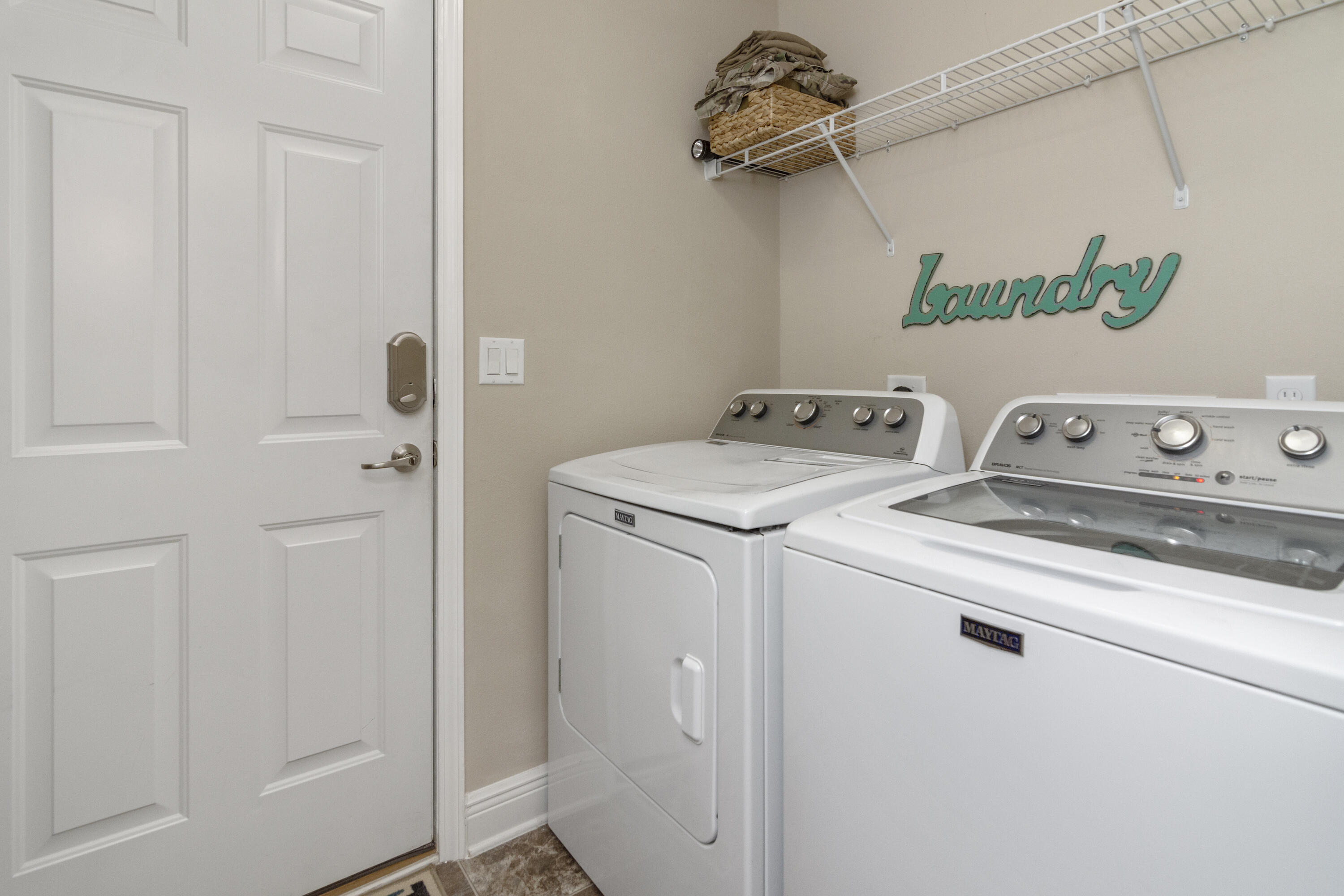 306 Gauntlet Drive Crestview, FL 32539 - Photo 28 of 32 a utility room with dryer and washer