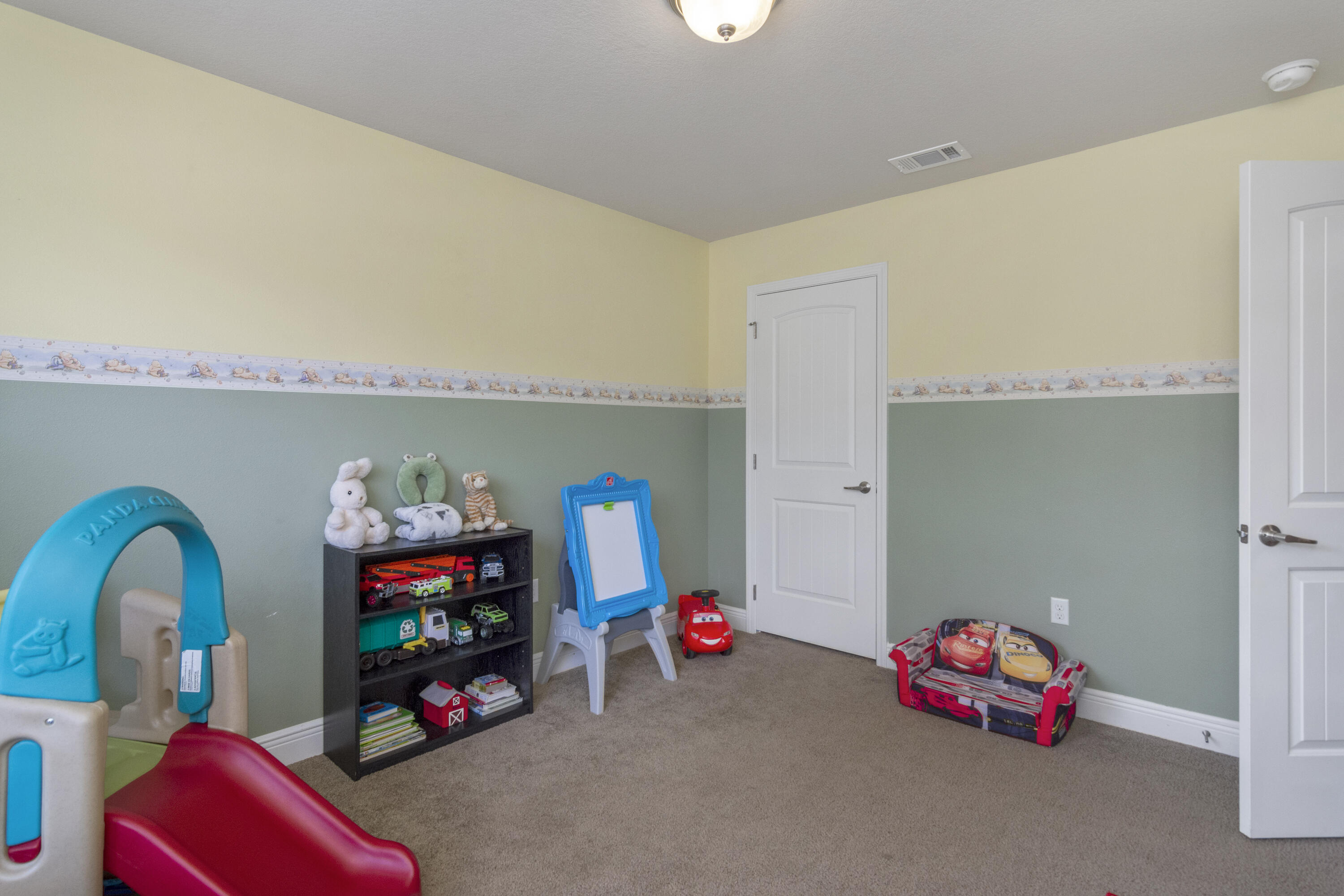 306 Gauntlet Drive Crestview, FL 32539 - Photo 6 of 32 a play room with toys