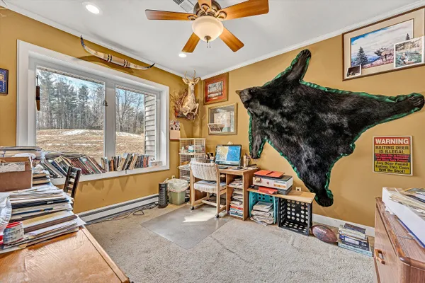 a view of livingroom with furniture and window