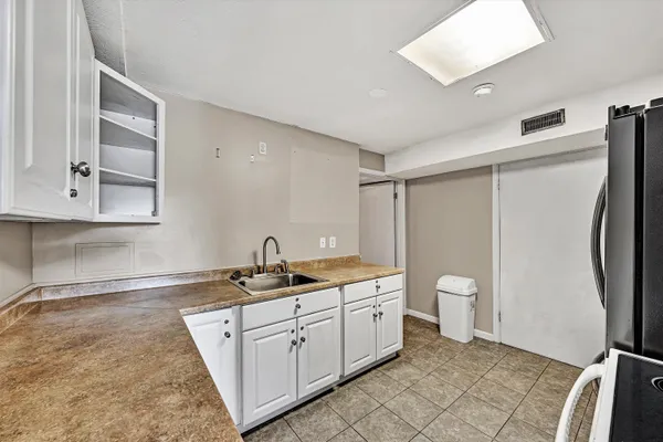 a view of a swimming pool with a yard