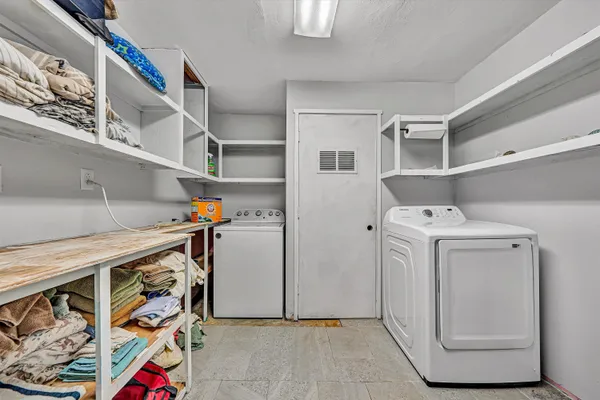 a front view of house with yard and seating area
