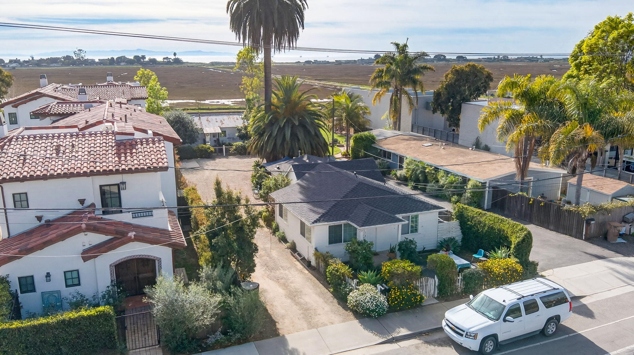 4253 Carpinteria Avenue Carpinteria, CA 93013 - Photo 3 of 11 a view of a house with a yard and potted plants
