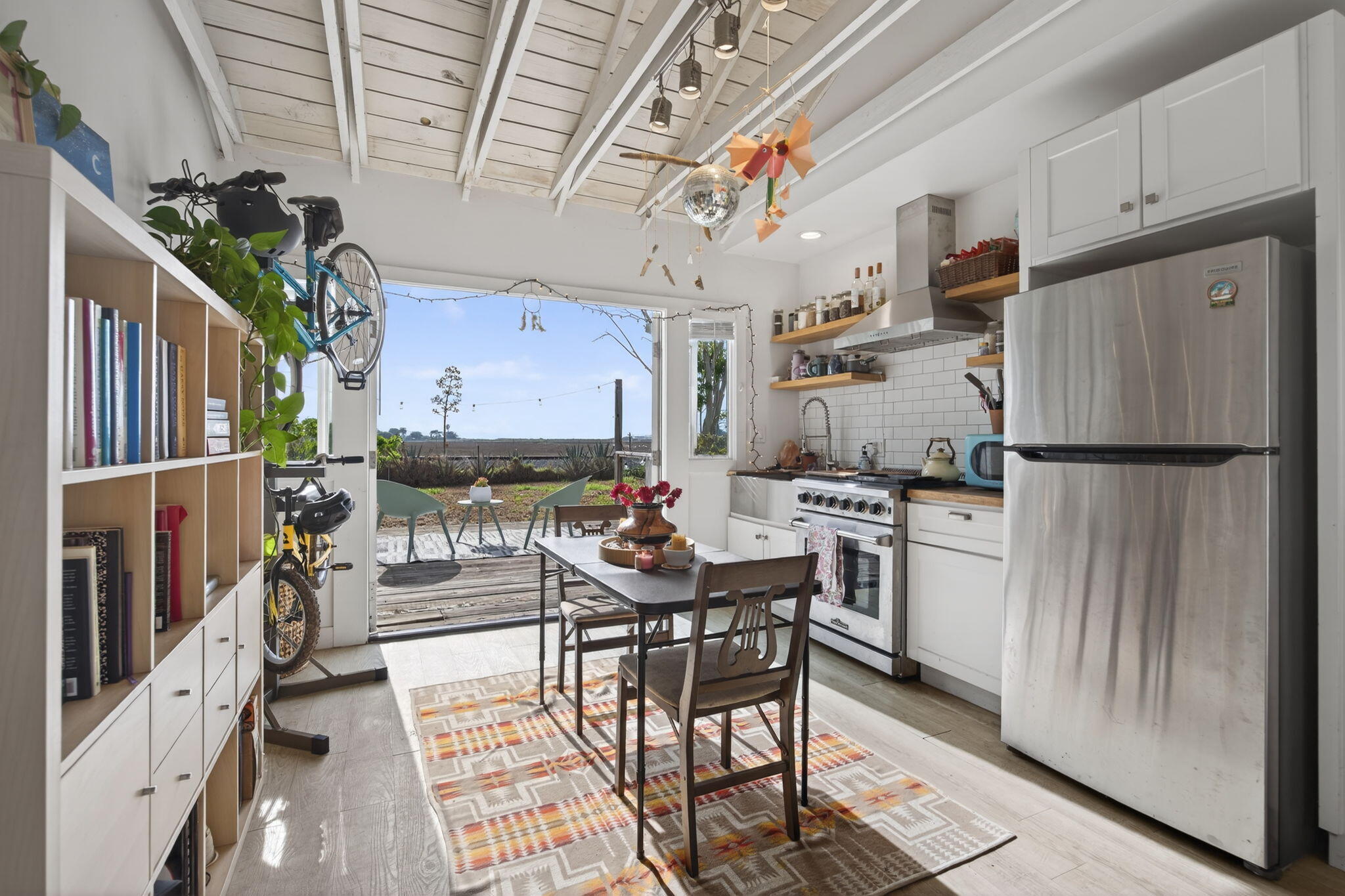 4253 Carpinteria Avenue Carpinteria, CA 93013 - Photo 7 of 11 a kitchen with stainless steel appliances granite countertop a refrigerator and a stove