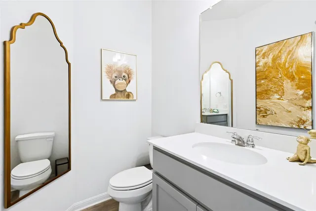 a kitchen with a sink a counter top space and cabinets