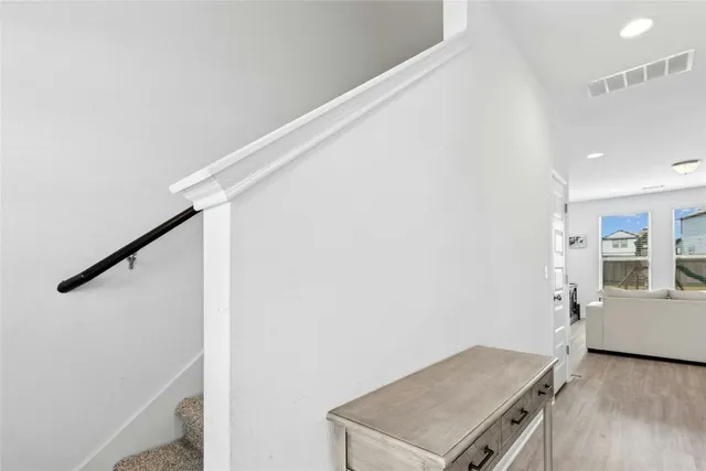 a view of a hallway with workspace