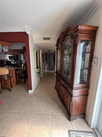 a view of a refrigerator and window