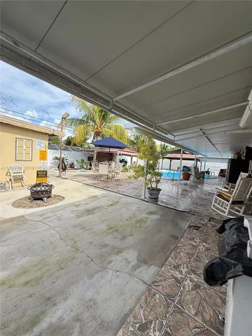 a view of parking garage with cars