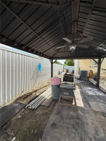 a view of a back yard of the house