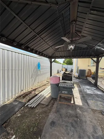 a view of a back yard of the house