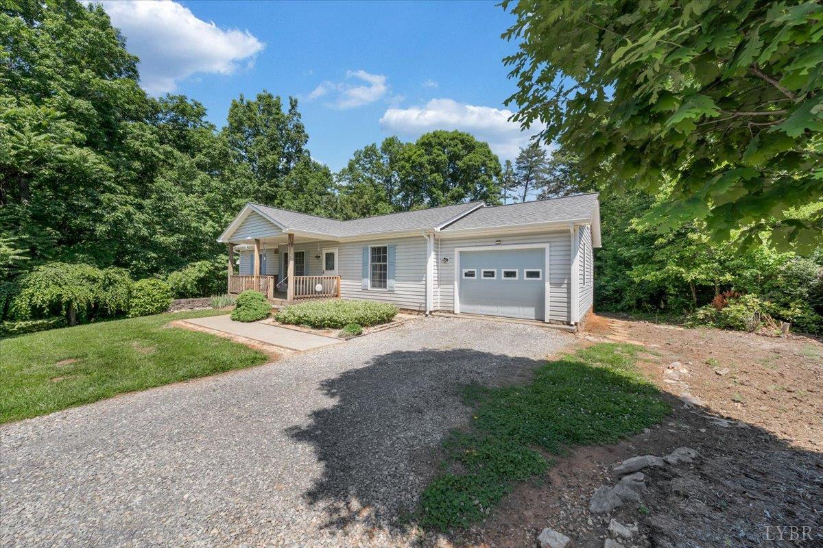 1124 Homeplace Road Bedford, VA 24523 - Photo 43 of 47 a front view of house with yard and green space